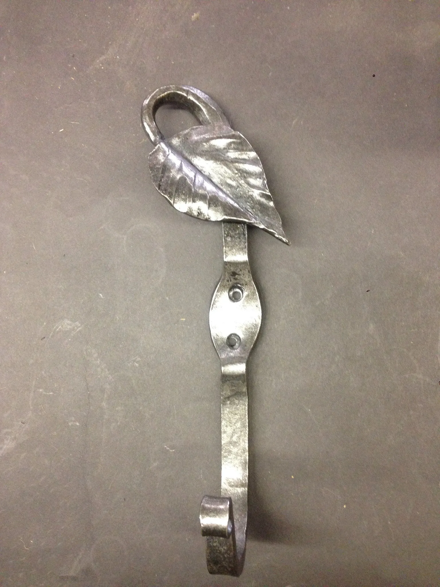 Leaf coat hook.