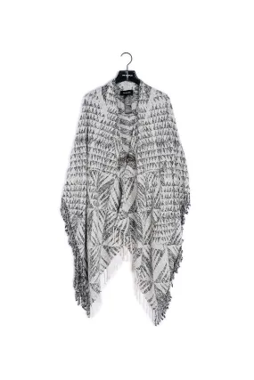 Poncho zébré à fermoir bijou