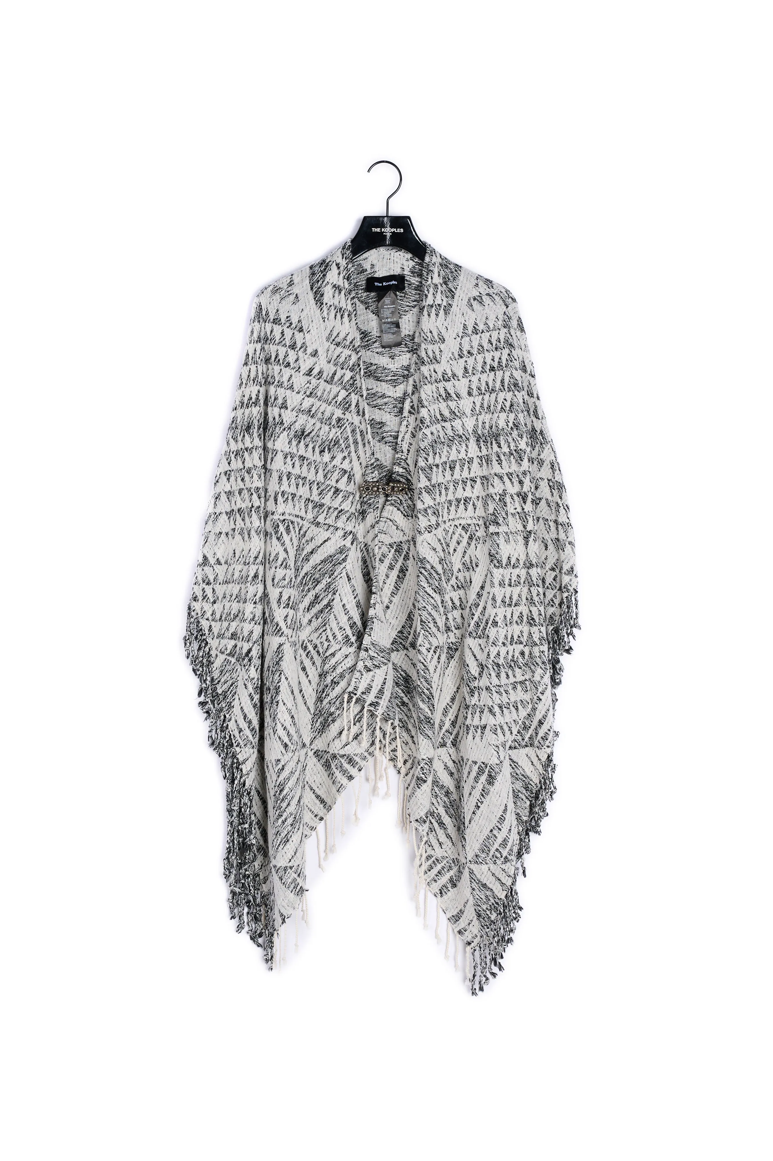 Poncho zébré à fermoir bijou